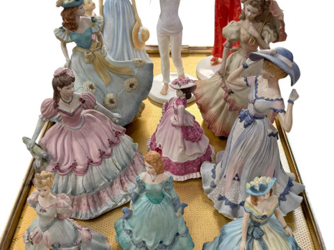 Eight Coalport and three Royal Doulton figures (11).