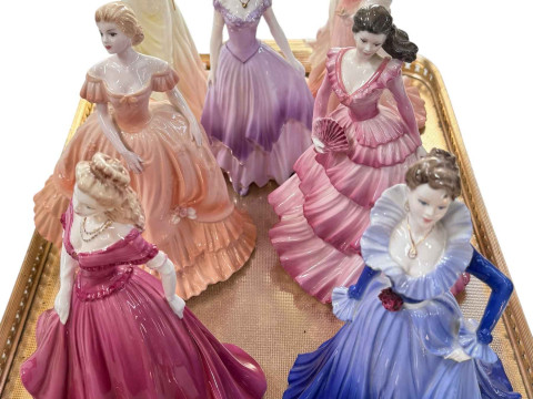 Seven Coalport Ladies of Fashion figures.