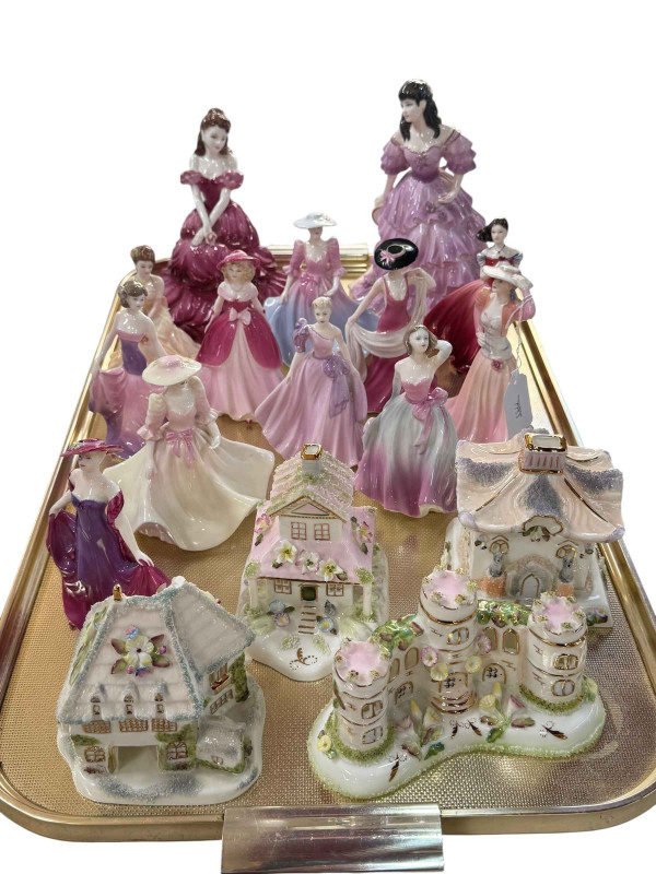 Thirteen Coalport lady figures and four cottages.