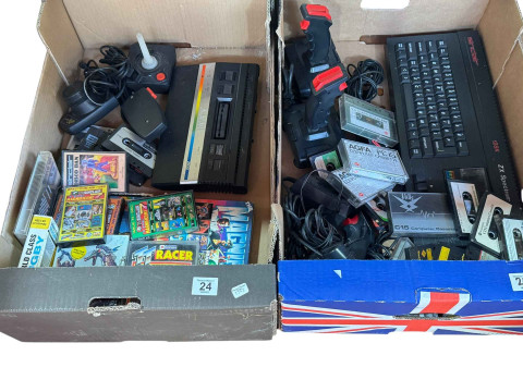 Two boxes of vintage computer equipment including Spectrum, Atari etc.