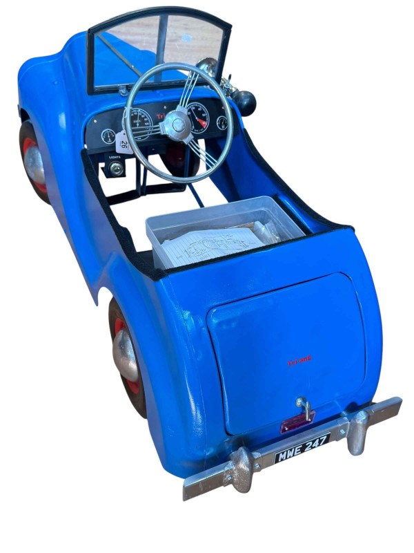 Triang pedal car with battery power.