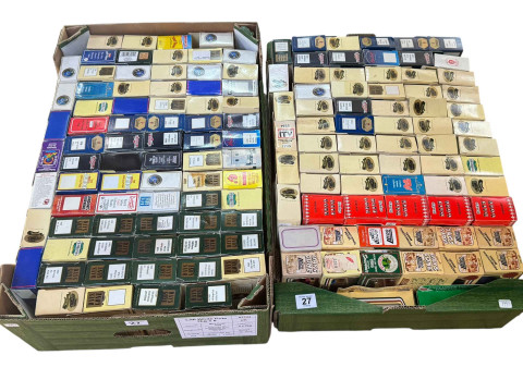 Two boxes of Lledo model vehicles.