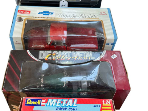 Four boxed Diecast vehicles including Revell, Sunstar, Ricko etc.