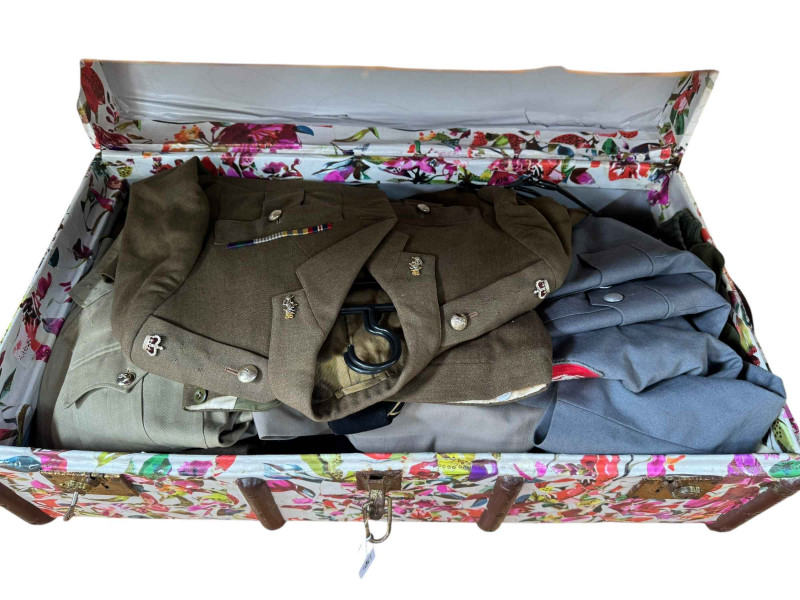 Two trunks of military uniforms, trench art, wall plaque etc.