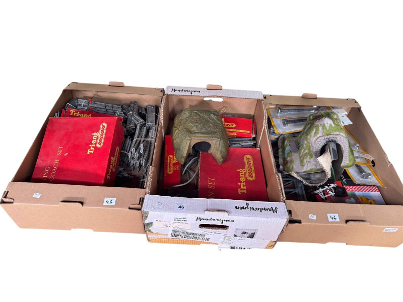 Collection of Hornby railway magazines, track, empty display presentation case etc.