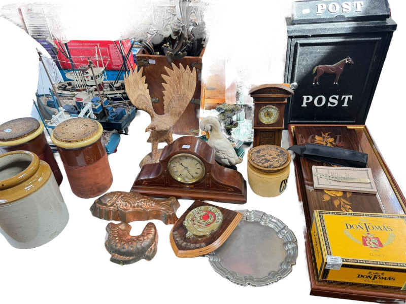 Mahogany inlaid mantel clock, fish jelly moulds, carved eagle, letter post box, cast metal stick stand, three model boats on stands, stoneware jar, Suffolk Potteries jars etc.