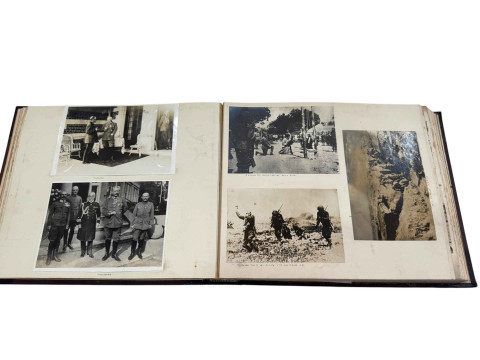 WITHDRAWN       A one-off WWI military albumen photograph album, including Hindenburg, Ludendorf and Kaiser group photos, a Russian spy praying before being hung, fallen Handley plane in German Lines, German observation balloon, British troops killed, six spies led to be shot by the Germans, Ripon Camp, family holiday snapshots etc. thumbnail