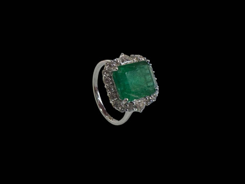 Emerald and diamond cluster ring, set in 18 carat white gold, size N,...