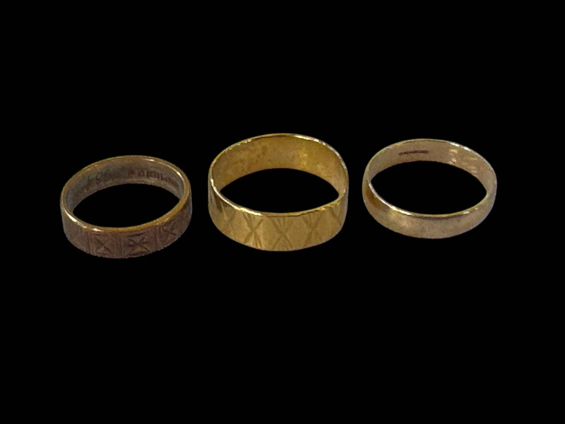 Two 9 carat gold wedding bands and one 22 carat gold band (3).