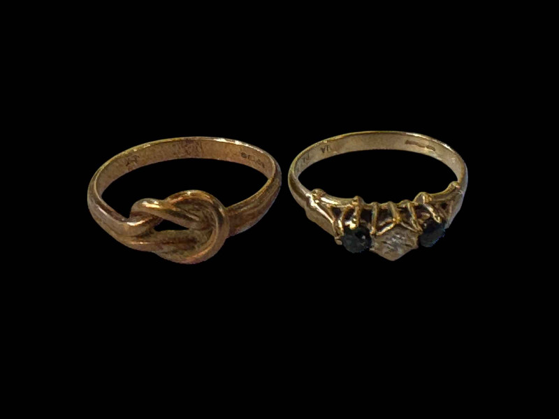 Two 9 carat gold rings, sapphire and diamond and knot.