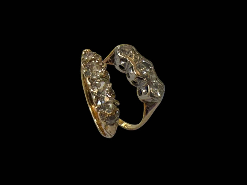 Two 18 carat gold diamond set rings.
