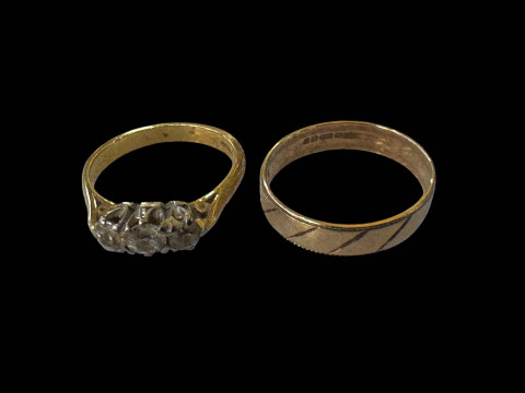 Diamond three-stone 18 carat gold ring, size L and 9 carat gold wedding...