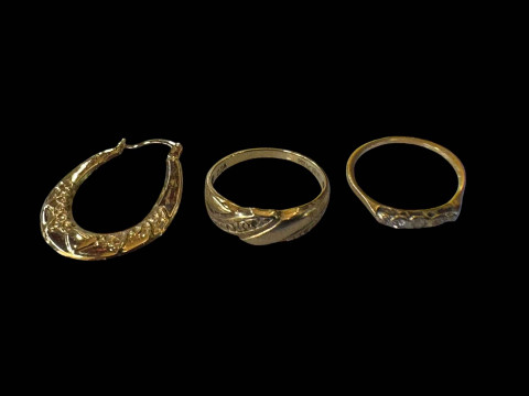 Two rings and single earring, two hallmarked 9 carat gold.