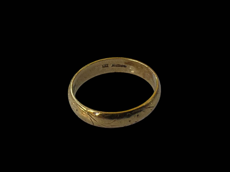 18 carat gold wedding band.