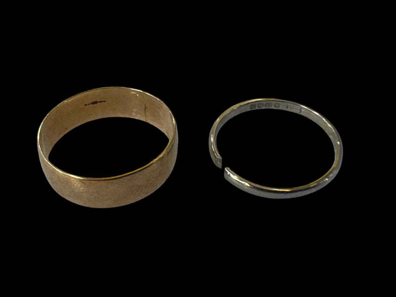 18 carat white gold cut wedding band and 9 carat gold wedding band.