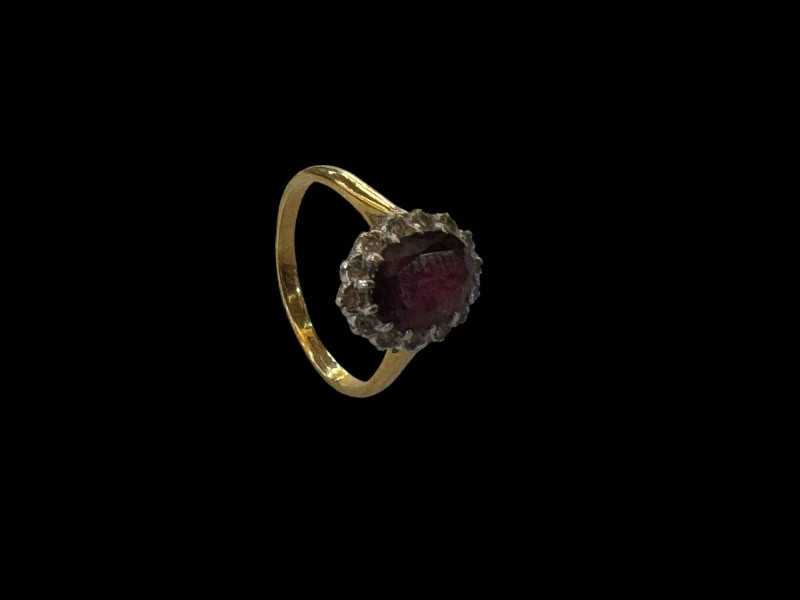 Ruby and diamond 18 carat gold and platinum ring, size Q.
