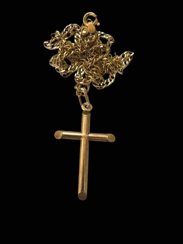 18 carat chain link necklace with 9 carat gold cross pendant.