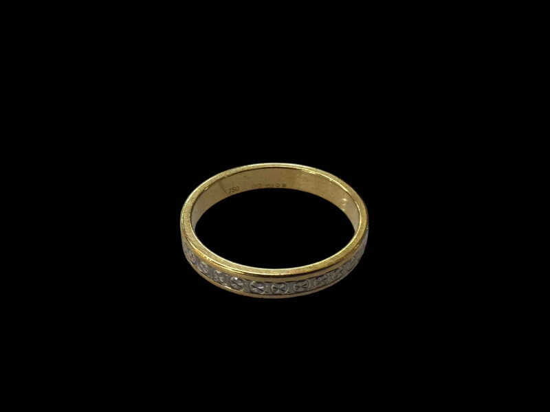 18 carat gold eternity ring.
