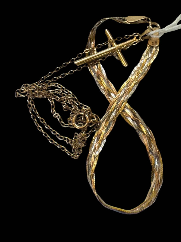 9 carat gold crucifix pendant with chain and two colour bracelet (could be gold and silver) (2).