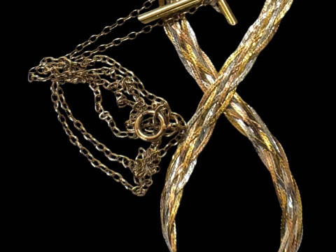 9 carat gold crucifix pendant with chain and two colour bracelet (could...