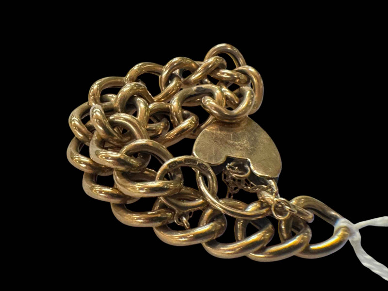 9 carat gold curb bracelet.