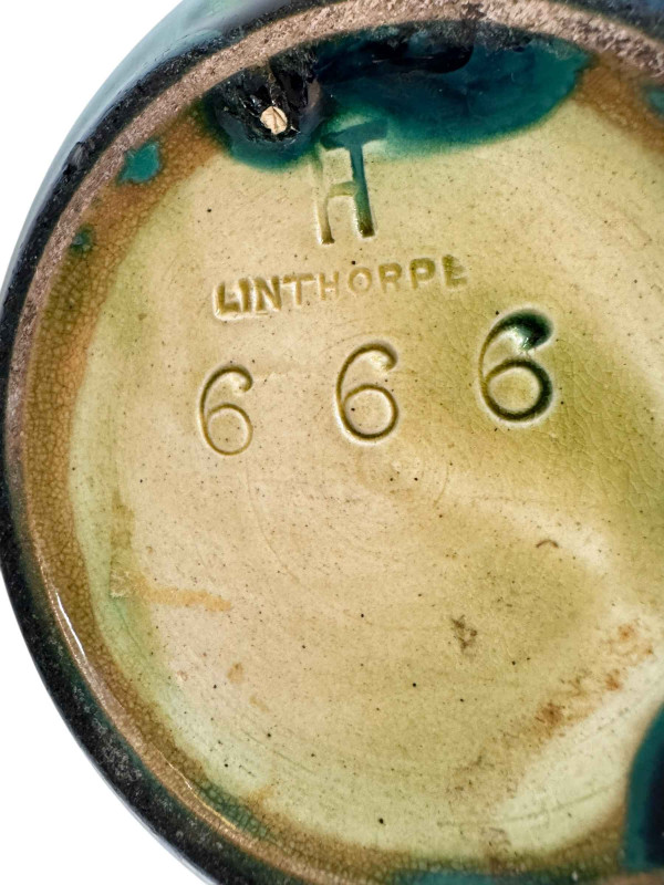 Linthorpe pottery jug, impressed marks with shape no. 666, 14cm.