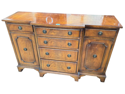 Mahogany breakfront side cabinet having four central drawers flanked by...