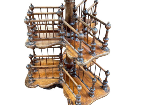 Victorian walnut revolving twelve-division graduated Canterbury/book stand...
