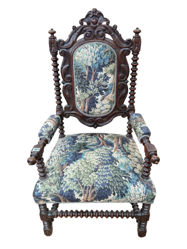 Victorian carved oak bobbin column open armchair in tapestry fabric.