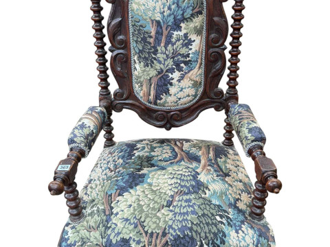 Victorian carved oak bobbin column open armchair in tapestry fabric.