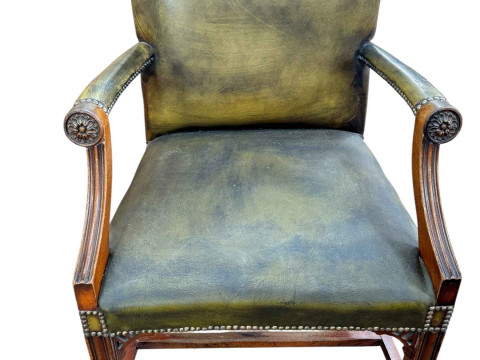 Green leather and studded Gainsborough style chair.
