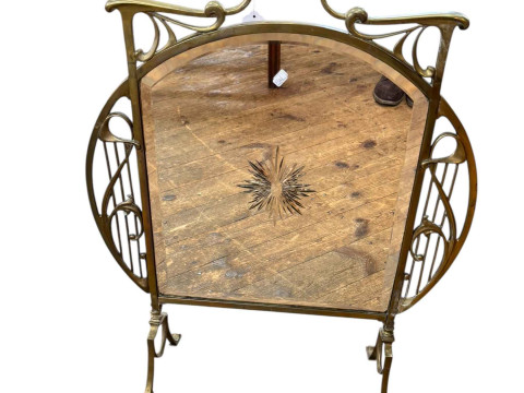 Art Nouveau brass and bevelled mirror fire screen, 75cm by 61cm.