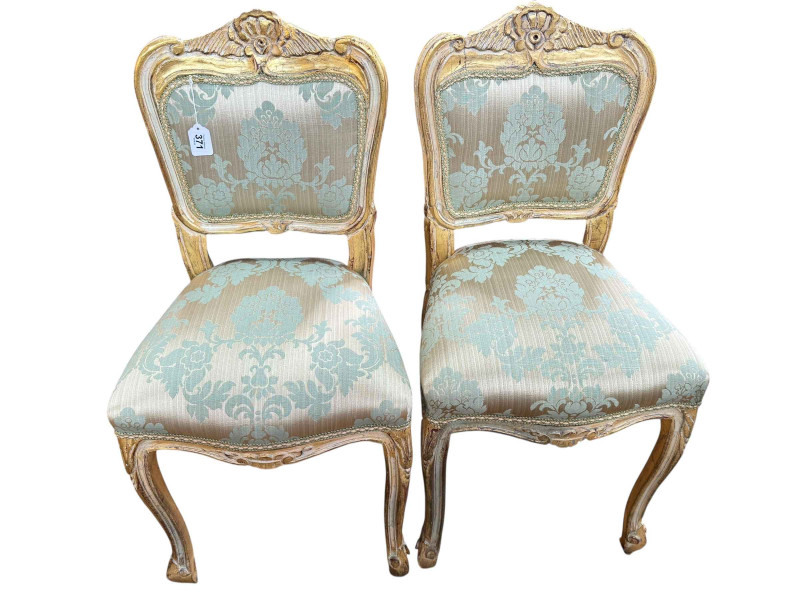 Pair gilt painted and cream painted French salon chairs.