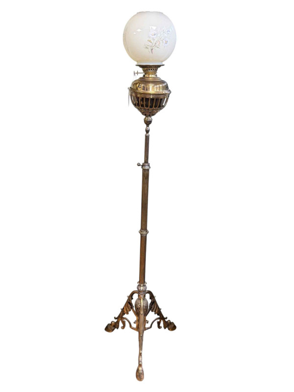 Brass telescopic standard oil lamp on triform base.