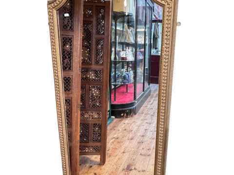 Rectangular arched top wall mirror in painted gilt frame, 167cm by 78cm.