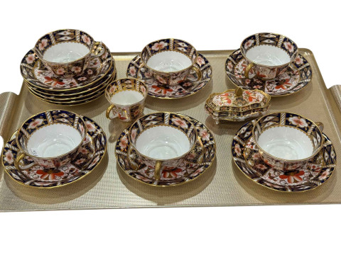 Collection of Royal Crown Derby including trinket box, cups and saucers.