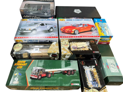 Collection of Diecast boxed vehicles including Eddie Stobart, Maisto,...