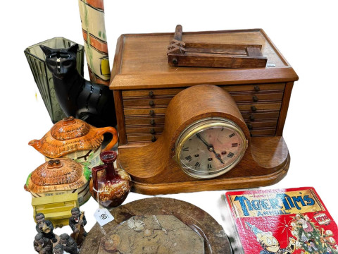 Six drawer display cabinet, mantel clock, decorative pottery, pictures,...