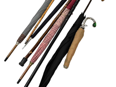Collection of walking sticks and umbrellas including gold mounted dated...