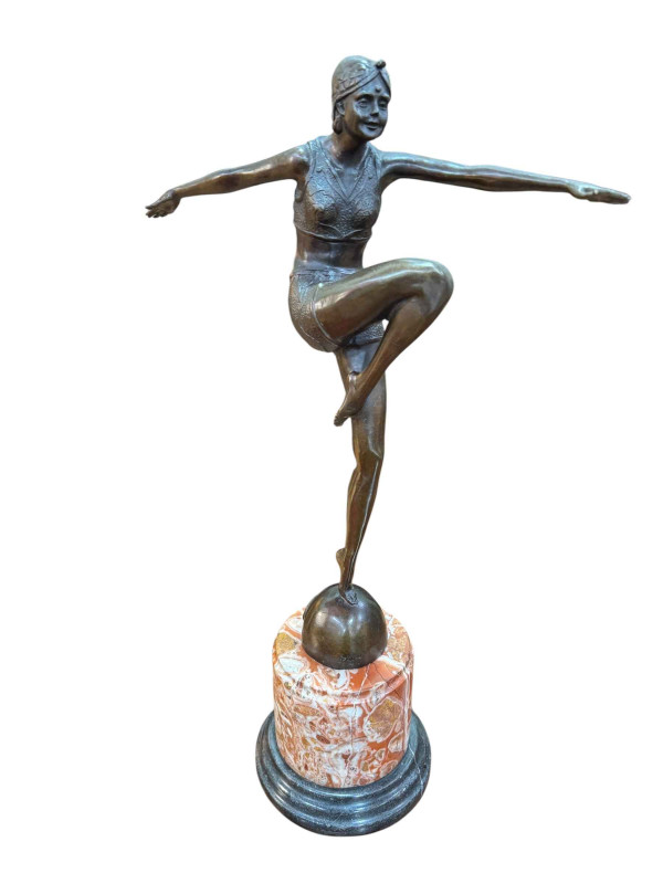 Bronze figure of an Art Deco dancer on marble plinth.