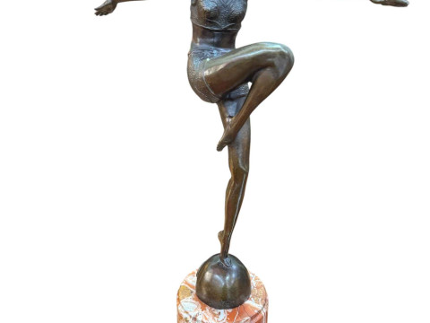 Bronze figure of an Art Deco dancer on marble plinth.