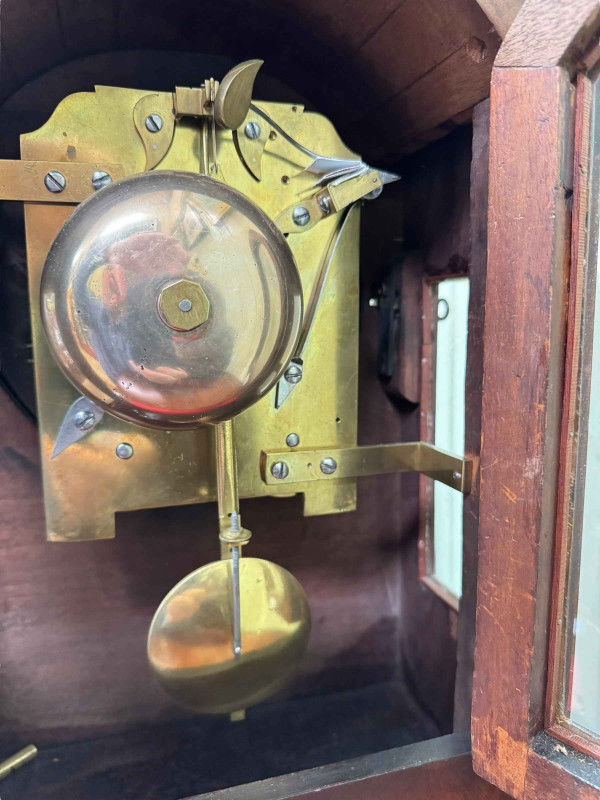 Victorian mahogany and brass inlaid fusee bracket clock with circular brass dial, 42cm high.