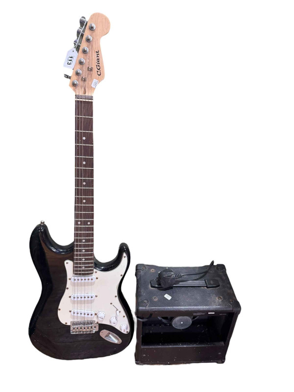 Electric guitar marked C Giant with amp.