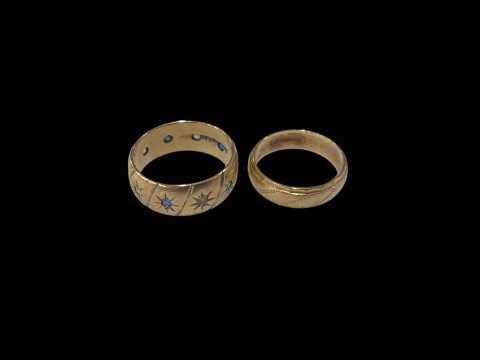 Two 9 carat gold band rings, one gem set.