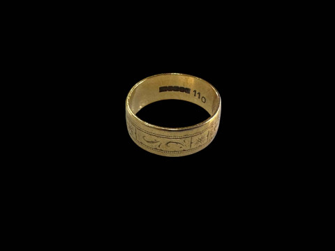 18 carat gold wedding band.