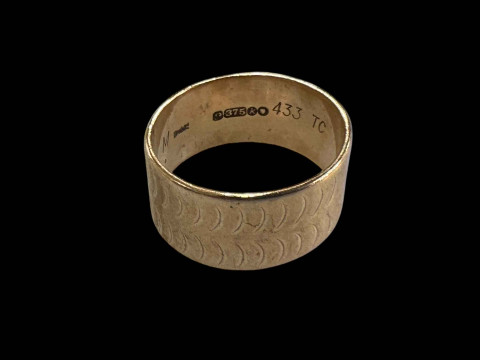 9 carat gold wedding band.