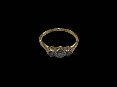 Diamond three stone 18 carat gold ring, size N/O.