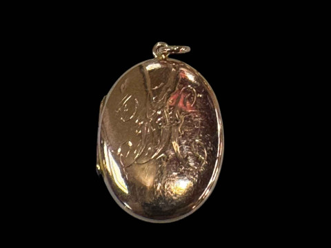 9 carat gold oval locket.