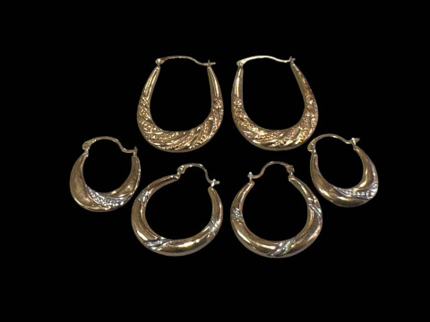 Three pairs of 9 carat gold earrings.