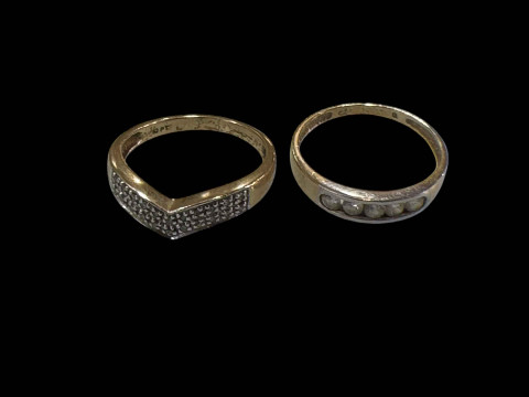 Two 9 carat gold gem set rings.